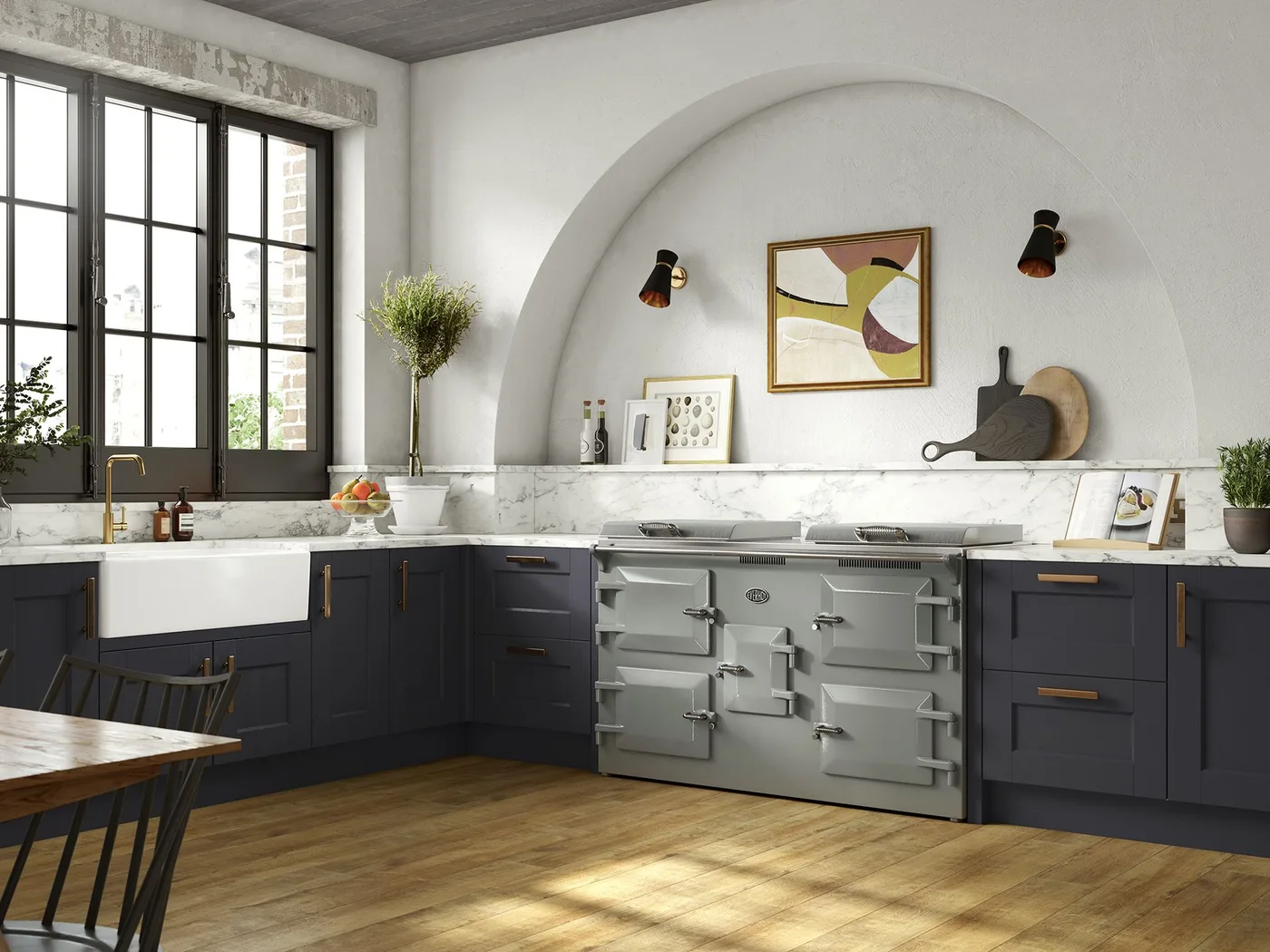 Dark blue lower cabinets stand beside a gray cooker inside a pale arched recess with a white apron-front sink and dark-framed windows