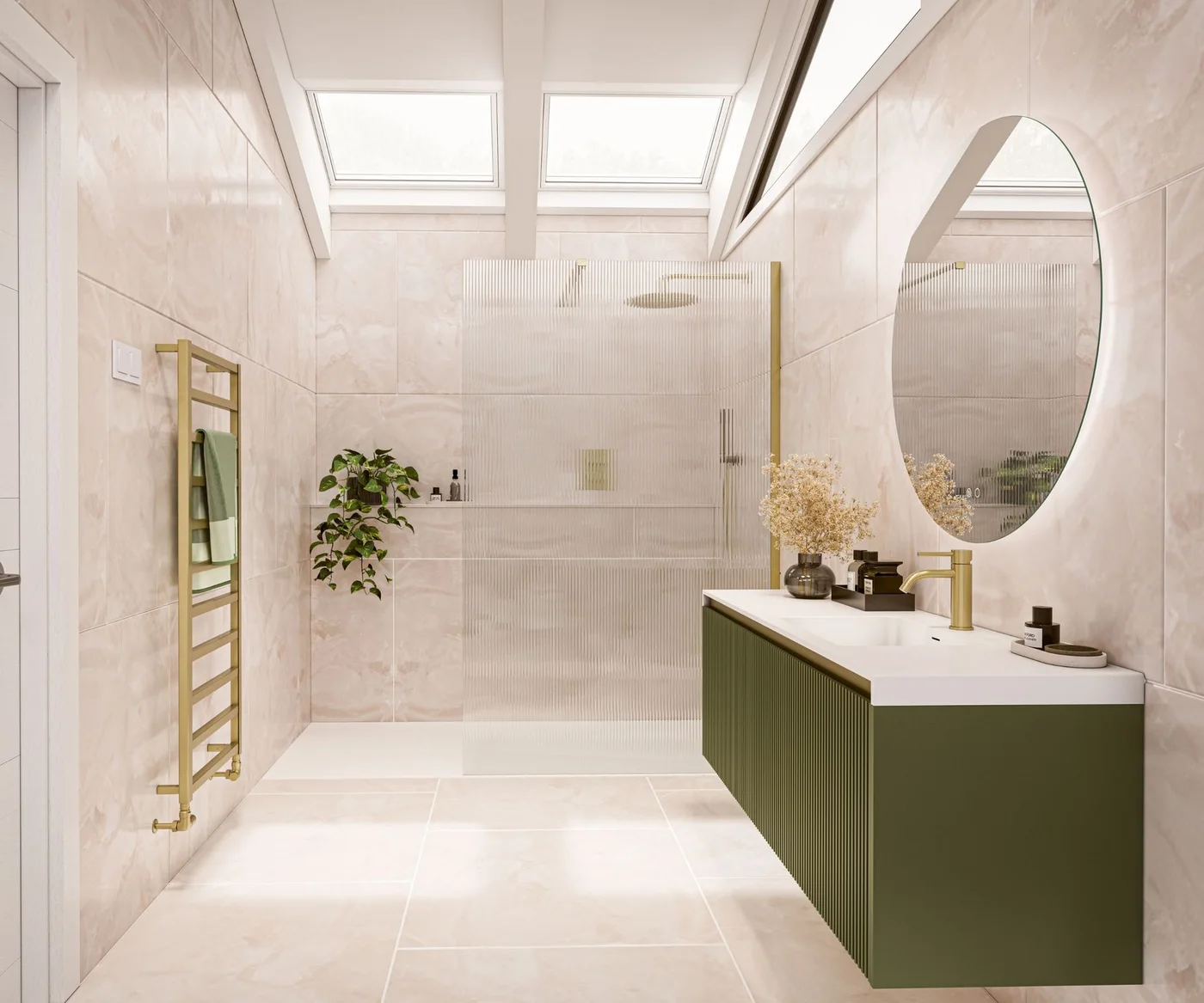 A ribbed green floating vanity sits below an oval mirror beside pale tiled walls, a clear shower screen, gold-toned fittings and two roof windows