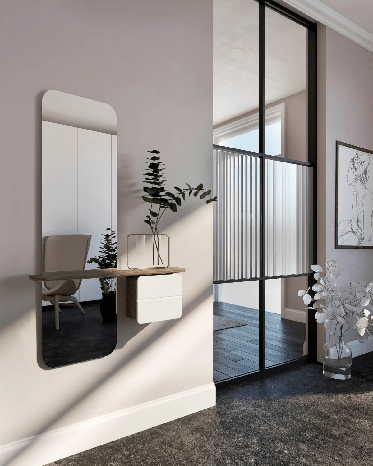 A tall rounded mirror has a narrow wooden shelf and pale wall-mounted drawer beside a black-framed glazed doorway